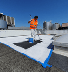 Peinture cool roof appliquée sur toiture